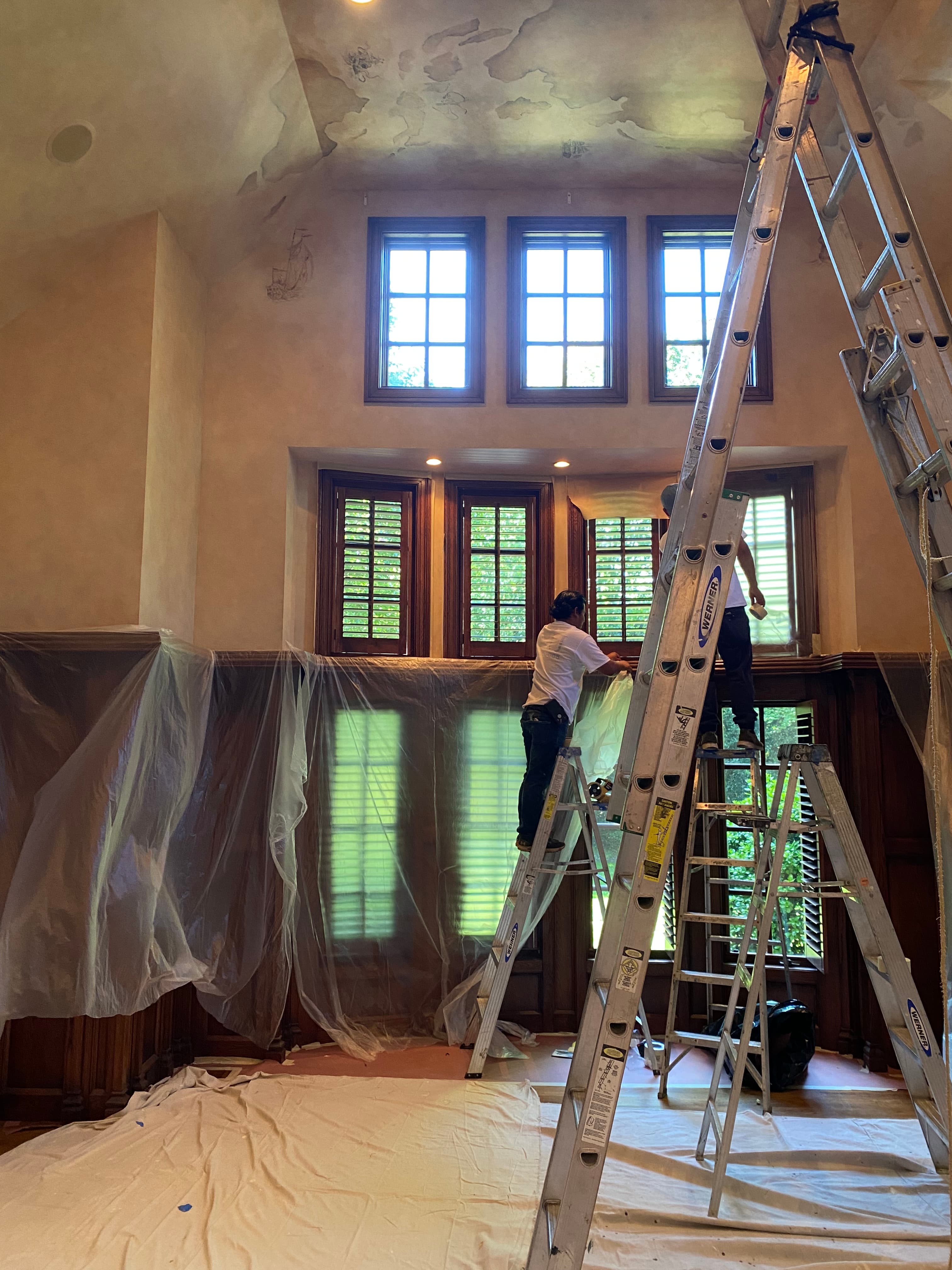 Interior painting in progress — professional prep work